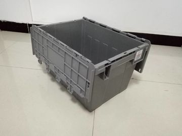 Yellow Plastic Storage Bins Attached Lids Stacked For Transportation